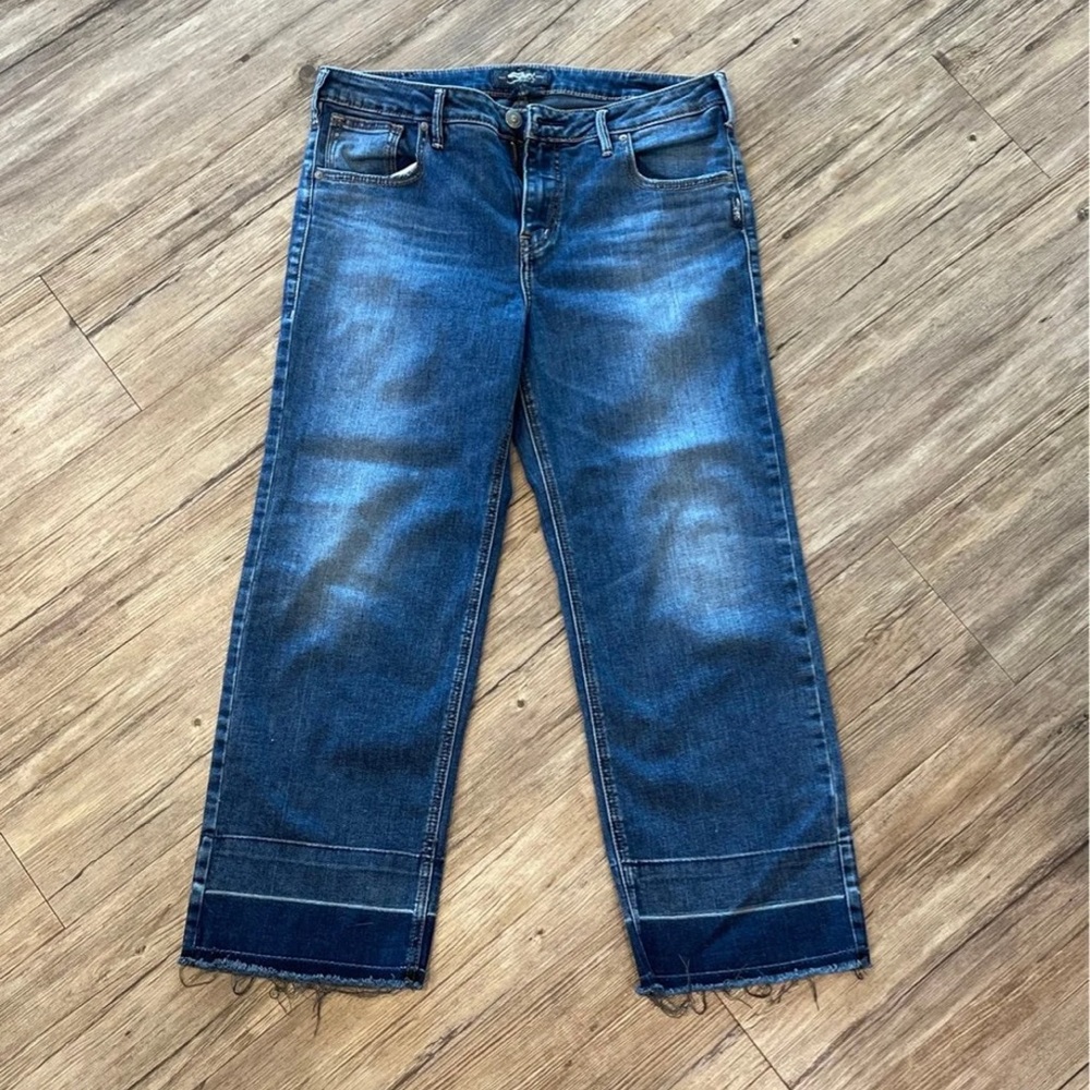 Silver jeans.
